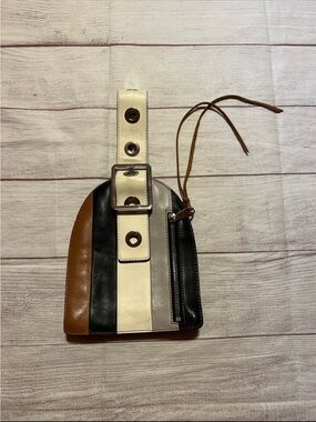 Rebecca Minkoff Hook Up Museum Wristlet crafted from colorblock leather